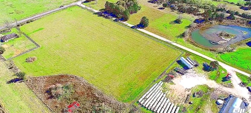 22311 Stokes Road Waller, Texas Just under 5 unrestricted acres - cleared and ready to build your dream home. Quiet neighbors and less than 10 minutes from Houston Premium Outlet mall. Country charm with city convenience!