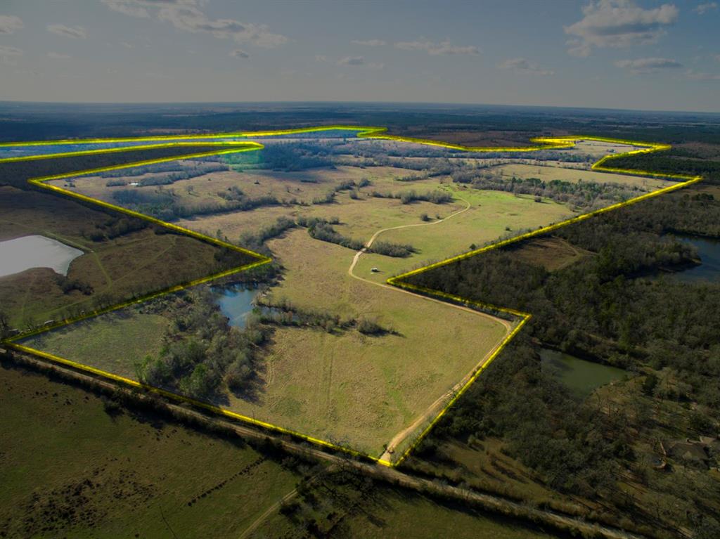 0000 CR 3470 Lovelady, Texas Lost Creek Ranch, 1381 acres, is a historic family owned cattle ranch in the community of Pearsons Chapel, west of Lovelady, Texas. Rolling hills in native pasture land with scattered trees, bisected by natural hardwood creek drains. Beautiful vista views from several different hilltops. 14 lakes and ponds. Fenced and cross fenced. Offered in whole or 2 parts, Lost Creek Ranch, is diverse upland with fertile bottomland along the creek drains. Excellent for livestock and/or recreational. Ie; hunting, atv’s, etc…