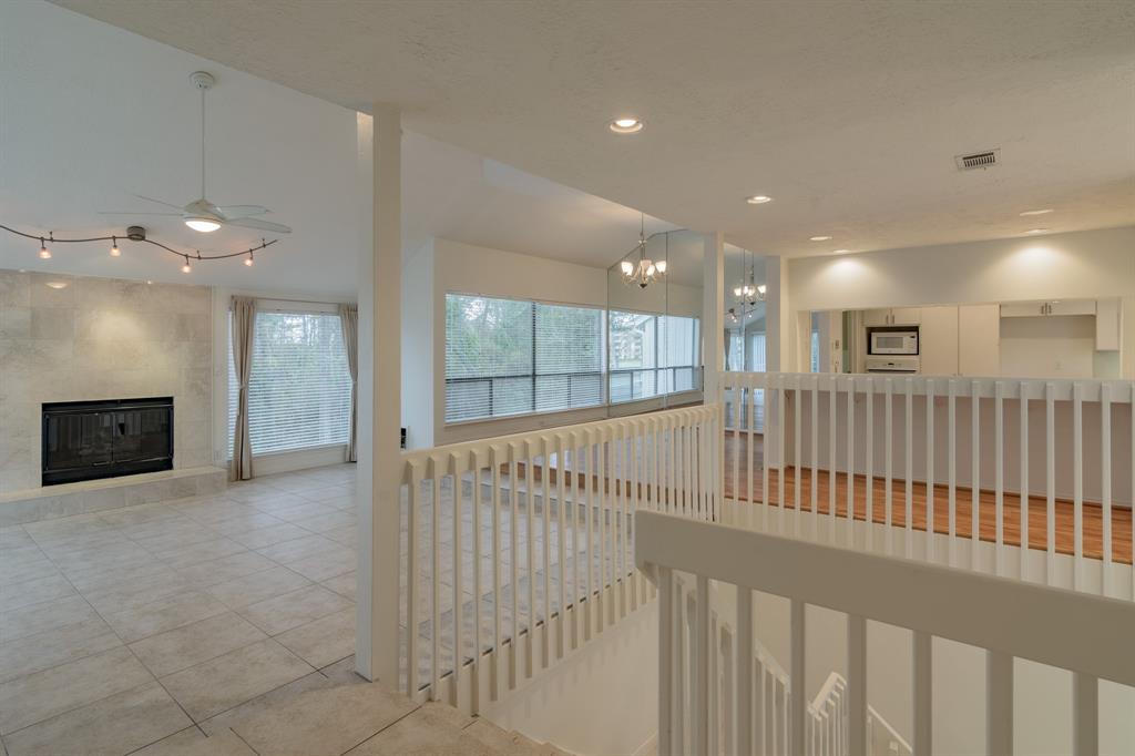 26 Lazy Lane The Woodlands, Texas Amazing 2 story home located in the front of The Woodlands. Quietly tucked away in cul de sac right near The Woodlands Country Club and golf course. Freshly painted exterior and interior gives this home a fresh and welcoming appearance. The open concept floor plan is unique and allows plenty of natural light. Updated, clean, tile throughout living areas. 3 bed, 2 and a half bath home, complete with large patio off of the main living area. Office or potential 4th bedroom flex- gameroom. White and bright kitchen cooktop island. 2 car attached garage and lots of great closet space and storage.