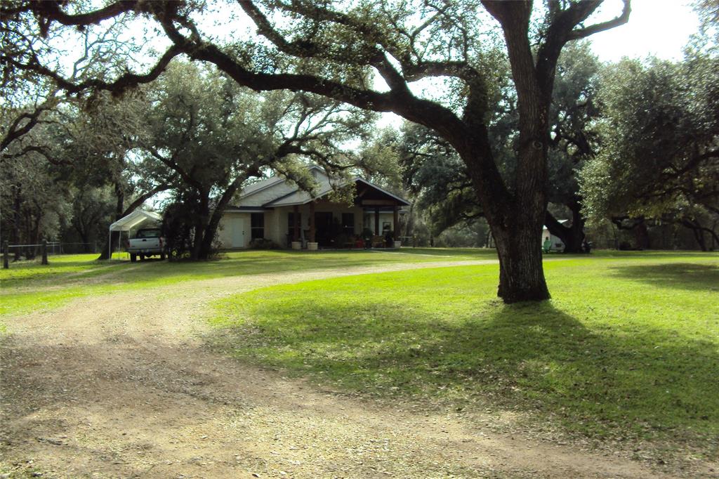 1493 FM 2437 Sheridan, Texas SPECTACULAR RANCH RECREATIONAL PARADISE
This outstanding ranch is conveniently located about 2.5 miles south of Hwy. 90A in Sheridan and the Splashway Water Park on a paved county road. The property has easy access to Houston & Victoria. The home was completed in 2010 with all the modern conveniences, including Ca?H, 10 ft ceilings, custom cabinetry and much more. The hm is set back from the road for privacy and is surrounded by massive Live Oaks. The ranch is AG EXEMPT and an absolute DREAM COME TRUE for any recreational enthusiast. The property has been selectively cleared and offers a vast amt of woods for hunting, 2 stocked ponds and some open areas for planting food plots or cattle grazing and cleared trails for exploring. There is electricity that runs along the back side of the property and an old windmill. The property has a gentle roll and numerous picturesque home sites.
