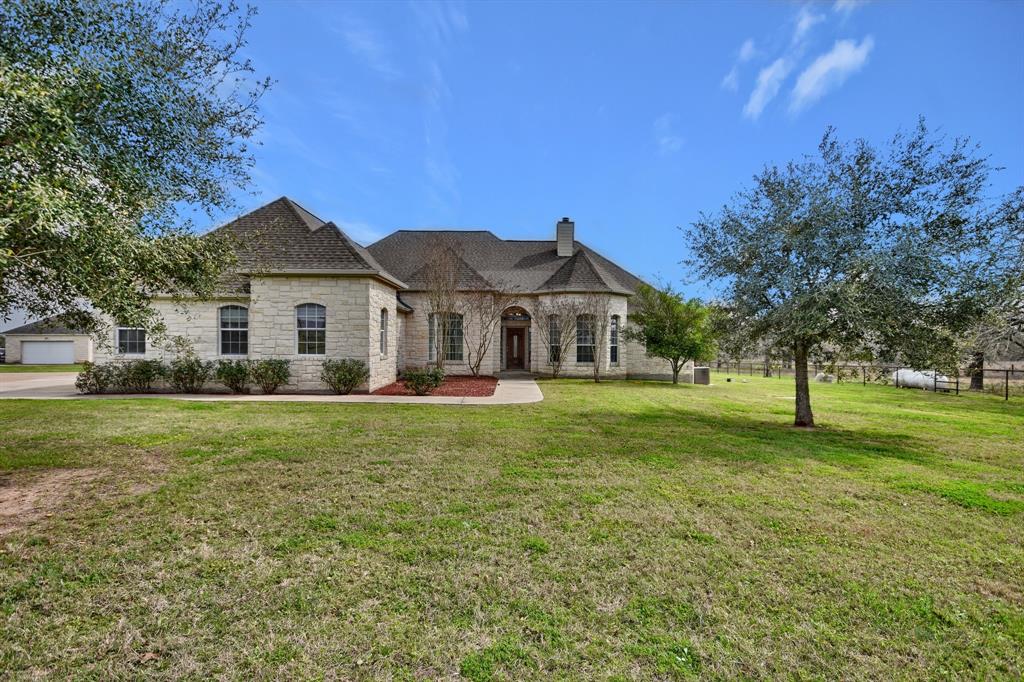 663 Highway 95 Smithville, Texas This beautriful 4B/3BA +½ BA home is located just a few miles from the charming town of Smithville between Austin, Houston, San Antonio and Bryan-College Station. Features include kitchen/breakfast area with an open concept, spacious living areas with vaulted ceilings, fireplace and a covered back porch for simple lounging while enjoying the pool and outdoor living. This 11 acre ranchette includes a 40x40 barn/tack room, horse barn with livestock pens and pond. A MUST SEE!