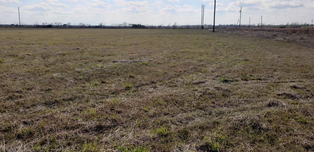 6558 Beckendorff Road Sealy, Texas Make your country living dream a reality on this already cleared, fenced in 11 acre property. Build your dream home, add your mobile home, or rehab the one already here! Enjoy country living on this peaceful lot located near I-10. The red tractor & large carport are also included. Property has it's own water well.