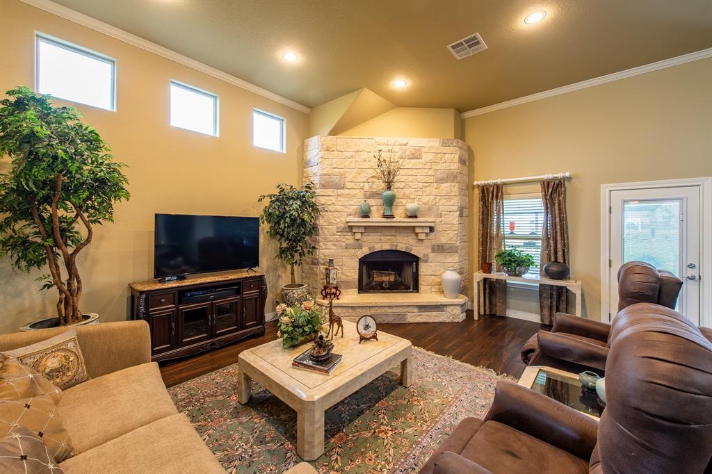 1005 Providence Landing Lane Columbus, Texas Stunning custom built home just outside the city limits of Columbus in Providence Landing, a restricted riverfront subdivision. The open concept home features 3 bedrooms & 2 baths. The new wood grain plank floor tile throughout the living areas, granite counter tops & beautiful stone fireplace make this a comfortable home to enjoy. Property is perimeter & cross fenced with a wrought iron solar controlled gate, an extended driveway for additional parking, 2 floored attics & a sprinkler system on trees/flower beds plus a 937 sq ft covered patio - perfect for entertaining. Another awesome feature is the private nearby 7 acre park on the Colorado River, complete with majestic pecan trees, picnic tables, grills & canoe launch. You'll enjoy the beautiful white sand beach of the Colorado River - the perfect place for fishing, watching wildlife, or sunrises & sunsets. THE PROPERTY/SUBDIVISION DID NOT FLOOD DURING HURRICANE HARVEY!
