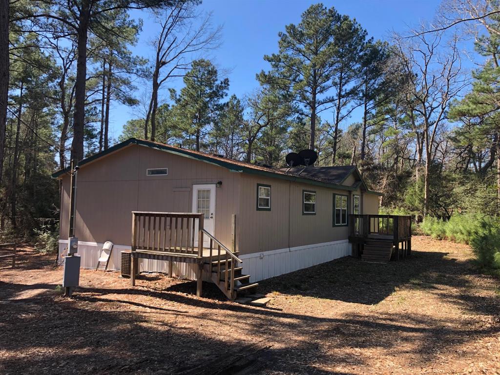 2651 County Road 274 Buffalo, Texas Buffalo 3 BED 2 BATH Home on 5.25AC with 30x50 Shop - Nice, Neat and Clean home sitting on a corner wooded property with dual access. The Home is in pristine condition being lightly lived in and well taken care of. The house is an open concept giving a nice flow to the living room and kitchen making it easy to accommodate family and friends. A wood burning fireplace is situated in a corner of the living area further giving it a spacious feel.
The 30x50 insulated shop with concrete floor is located on the opposite side of the property from the home and has water and electric available inside and outside the shop making it easy to work and even hook up an RV if needed.
Great place that is very secluded yet located on a black top road.