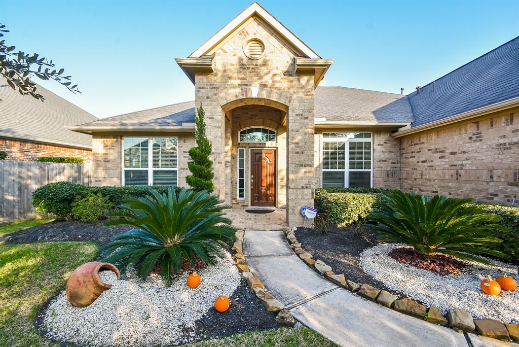18014 Sheldon Pines Spring, Texas Lovely layout in this one-story 4Bed/2.5Bath home. Charming use of space in an open floor plan from the formal living space to the den, kitchen and breakfast area all visible from entry hallway. The home is very close to area shopping, dining and recreation. The home has lots of updated features including vaulted ceilings in bedrooms and shared living areas; wall nooks to increase your decorating options; and updated electrical fixtures. The kitchen has a dual level granite countertop that makes for a beautiful breakfast bar that would work great for entertaining as well. Stainless appliances include a dishwasher, microwave, double oven and new gas stove cooktop. The master bedroom suite includes a bathroom with separate tub and shower, and separate dual vanities. The second bathroom in the home also has dual vanities. The fenced back yard includes an extended covered patio enough for lots of patio furniture and grill equipment to round out this home's top line entertainment package.