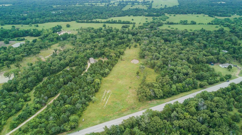 14500 Highway 21 North Zulch, Texas READY TO BUILD? Whether it is your dream home or time to develop a rural subdivision, look no further than this 10+ acre tract of land in North Zulch, right off of HWY 21 with easy access to Bryan, College Station, Madisonville, Huntsville and Houston! This property is partially cleared with water on site. Ready for a fantastic homesite with a pond in backyard or a neighborhood amenity! Call for a private showing today!