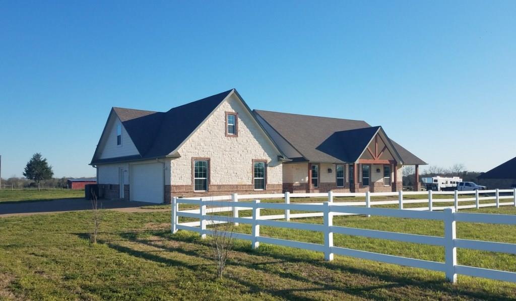 7718 Dilly Shaw Tap Road Bryan, Texas Your very own piece of Brazos Valley countryside is less than a 15 minute drive North East of Bryan in the Wixon Valley community. Just over 10 acres of ag exempt, cleared and fenced pasture provide an ideal setting for the Horse Lover or small cattle herd. Guests will be wowed by the vaulted ceiling, spacious living area, and the open kitchen with Granite counter tops and Stainless appliances. Bedrooms have ample floor space with generous closets. The Master suite is highlighted by the expansive, double sink vanity adjacent to the jetted tub and walk in shower. Fashion conscious mavens will have generous storage in the 120 sf master closet. A carpeted Bonus Room above the garage can easily become a luxurious home theater or a separated play or study area.