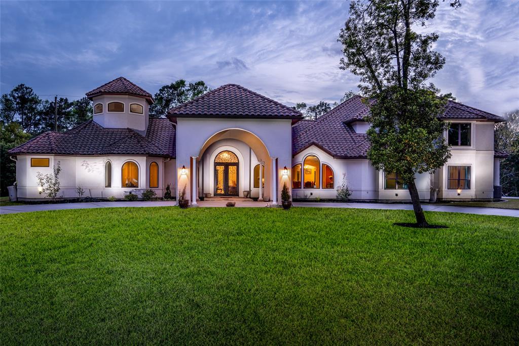 4639 Silver Jade Drive Spring, Texas This stunning Mediterranean style home is located on a quiet cul-de-sac and features a Magnificent front entrance with a circle drive, Terracotta tile roof, and a rod iron fence with automatic gate. This spectacular home boasts of a gourmet kitchen with custom cabinetry, wine grotto, wet bar and plenty of storage. The open floor plan features large windows with plenty of natural light, trayed ceilings, travertine flooring throughout the main living area, crown molding and beautiful French doors. The master retreat boasts of a rotunda entrance, a spa-like master bath, custom shower, large (his and her) closets with generous built-ins throughout, a gas fireplace and a private study. The home also includes a game and media room located on the second floor. The backyard has a covered patio, outdoor kitchen and a fireplace-perfect for entertaining!! The community provides trails, stocked lakes, parks, pool, fitness center, basketball and tennis courts and baseball fields. Welcome Home!