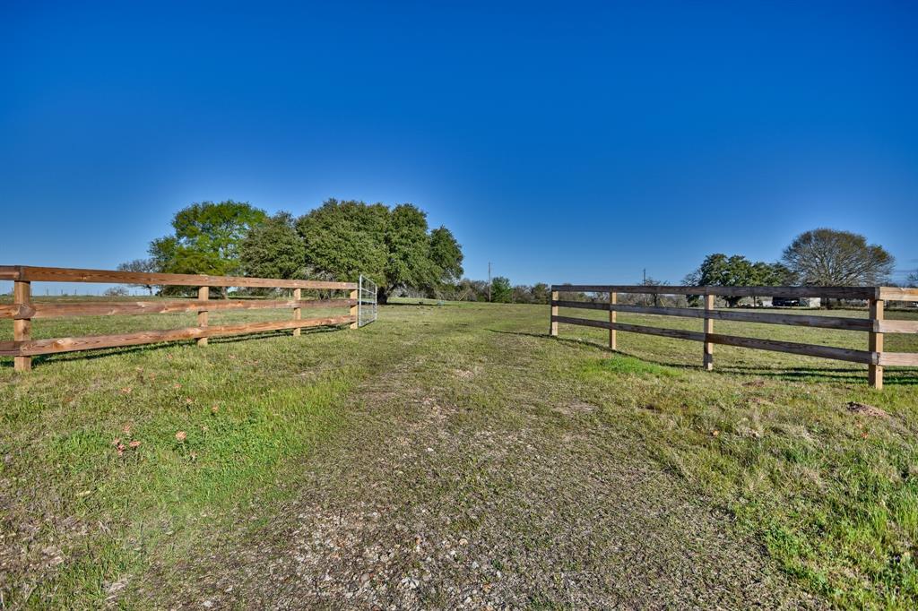 4339 FM 180 Ledbetter, Texas This 21.18 acres is the perfect country setting, conveniently located midway between Houston and Austin. A beautiful home site sits at the top of this property at 340 feet, where you can see for miles. Mature oak trees scattered throughout, completely fenced, and a pond allows you to run cattle and maintain the ag exemption. The back of the property slopes off towards Nails Creek, which provides a great environment for an abundance of wildlife. There are light restrictions to protect your investment. Electricity on site, water well needs a new pump.