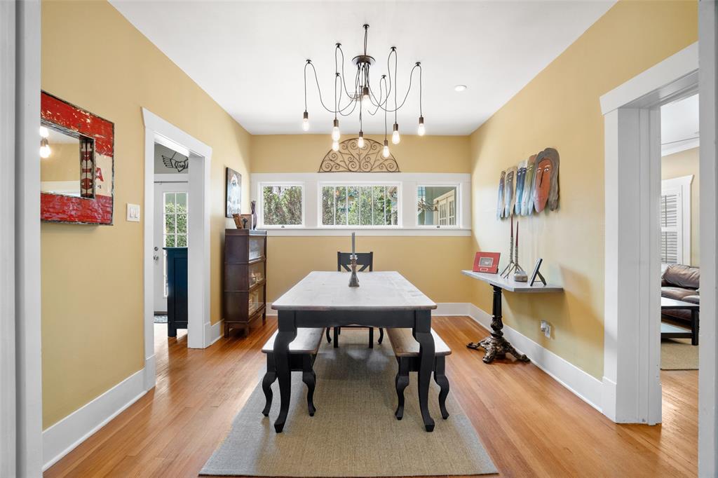 Sitting ideally between the living and family rooms and the kitchen is the spacious and bright dining room.  It will very comfortably accommodate a rectangular or round table set up, as well as additional side furniture.  Also great walls for art!