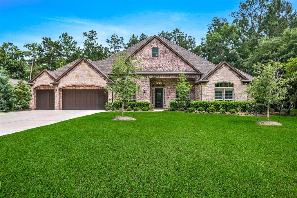 5406 Harvest Oak Landing Drive Spring, Texas GALLERY CUSTOM BLT 1 STORY DREAM! ENORMOUS .88 ACRE (per MCAD) WOODED CORNER LOT! Versatile Layout - Gameroom, Media Room, & Study - PLUS 4 Bdrms, All with En-Suite Baths! Beautiful Elevation - Sought-After 3 Car Garage! Unbelievable Island Kitchen: Stainless Electrolux Appliances (Including 6 Burner Range & Double Ovens) + Granite Counters + Pot Filler + Walk-In Pantry! Impressive Family Room - Stone Surround Gas Log Fireplace + Surround Sound Wiring! Elegant Formal Dining - Extensive Millwork + Plantation Shutters & Tray Ceiling! Study - French Doors! Dramatic Master Suite - Luxurious Bath with Dual Vanities, Oversized Shower with Dual Heads & Body Sprays, & Whirlpool Tub! Dual Walk-Ins! Movie Lover's Media Room - Platform Seating! Large Gameroom! Massive Screened In Patio - Remote Controlled with Fireplace & Outdoor Kitchen - Overlooks Super Tranquil, Park-Like Backyard with Mature Trees & Ample Space for Future Pool! Extra Large Storage Attic Storage Area! Great Community! W-O-W!