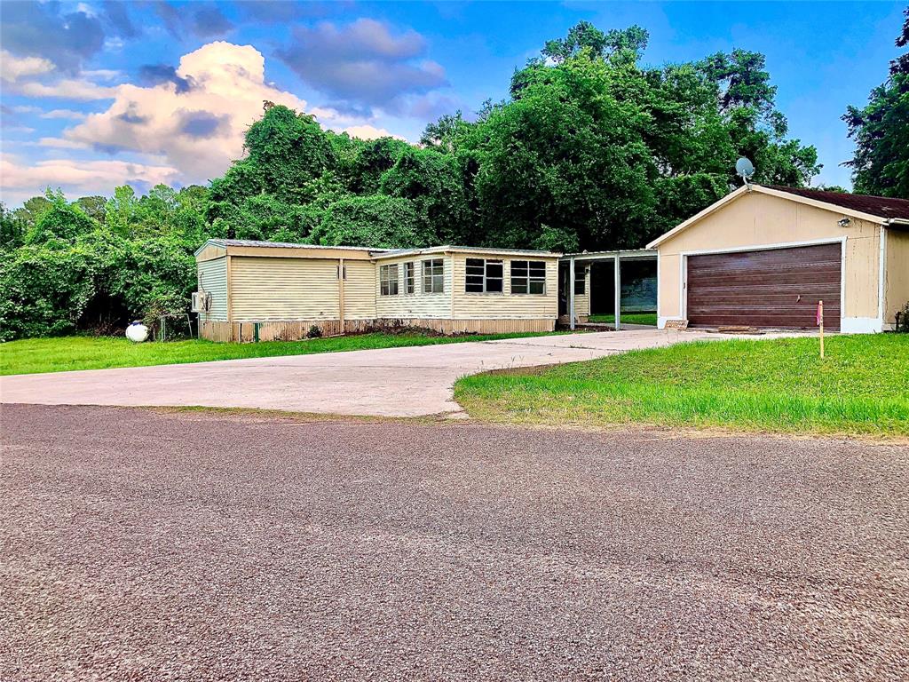14140 Shadow Bay Drive, Willis, TX 77318