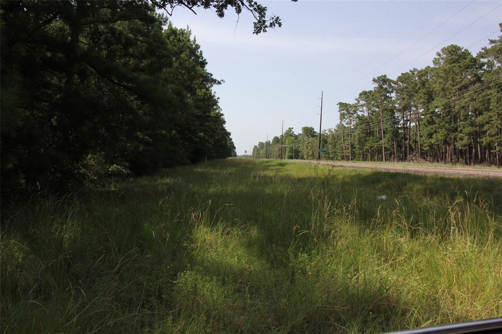 TBD Fm 980 N Point Blank, Texas Beautiful wooded acreage with frontage on FM 980. This property is just a couple of miles from Lake Livingston and Waterwood National Golf course. There are minimal restrictions but lots of room to build your dream home. This property is the remaining tract of a 36+/- acres. Survey shows acreage to be 13.273. Please note , in the photo sections, the survey show specifically which tract is for sale. There are utility easements on the south and west sides of this property. The gate is locked but used by the Waterwood MUD to access their storage tank on the southwest corner of the property. Please do NOT view property without notifying the agent or broker.