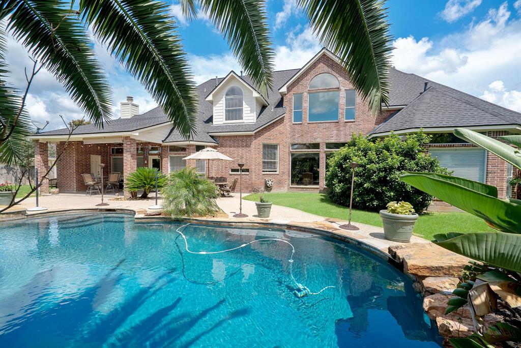 8314 Drew Haven Lane Spring, Texas *Check Out the 3D Tour* on this stunning Glenn Haven Estates Custom full brick home! One-of-a-kind opportunity to enjoy a private, Cul-de-Sac lot over Half an Acre with a sparkling Pool & Spa! The first floor master impresses with views of the pool and his & hers closets. Downstairs you will also find a study, formal living and dining, and an open kitchen/family room concept with beautiful windows providing tons of natural light! A second staircase will take you from the kitchen area up to three secondary bedrooms, large Game Room and additional room that can be used as a Media room or 5th bedroom. The oversized 3 Car Garage has a huge extra storage space for a workshop and there is an additional half bath outside conveniently located for quick access to the pool. Other noteworthy mentions would be recent roof, paint, and carpet as well as lots of storage! Fantastic location with easy access to 99, 249, Vintage Park, The Woodlands, IAH, and Exxon Campus plus top rated Klein Schools!