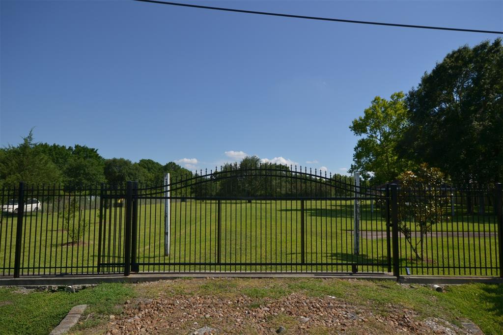 Amazing 2.4 Acre property in Houston Almeda Subdivision.  It is completely Fenced with two entrances.  The main entrance is on Broadhurst Dr. The other entrance is off of Foxshire ln. Nicely kept property with mature trees and fruit trees such as citrus, peach, figs and pecan trees .  Included in the property is a covered patio.  Opportunity for your dream home or for an investor to build homes as gated community.  Great location.  With in 20 minutes from down town, Texas Medical Center, Memorial Mall, Galleria, and Airport.