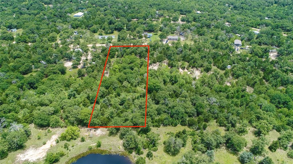 1710 Big Berry Somerville, Texas This 1.39 acre tract is FULL of character and charm and ready for you to make it your own! You heard me right, 1.39 ACRES! If you have been looking for a place close to Lake Somerville, this could be the spot for you! This property has TONS of beautiful established oak trees, and has a nice private feel. Whether you are looking for somewhere to build a permanent residence, or a weekend retreat to spend time at the lake, this is a great spot to make your own and enjoy the beauty of the outdoors! **Boundary lines drawn in photos are approximations and for illustrative purposes only.