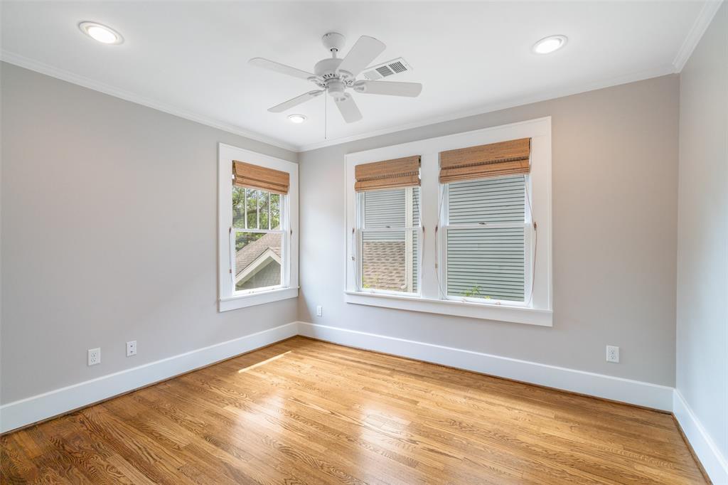 Like the other upstairs bedroom, this bedroom is well lit and provides generous storage.