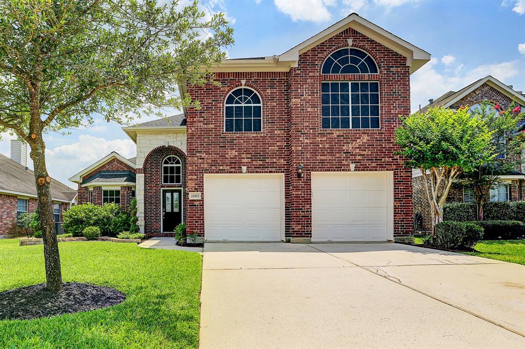 22907 Cinder Creek Court Tomball, Texas Stunning beautiful home provides an open floor plan boasting remarkable finishes including wood-like tile flooring throughout main living areas, gorgeous island kitchen offering crisp granter countertops, stainless steel appliances, abundant cabinetry, butler’s pantry, and walk-in pantry. Kitchen opens to lovely breakfast nook and spacious living area with gas log fireplace creating an inviting ambiance with large windows with views of the backyard. Master suite features dual sinks, vanity area, garden tub, separate shower and large walk-in closet. This fine home has it all with a guest bedroom down, additional full bath down, beautiful formal dining with crown molding, and large game room up that is great for entertaining. Amazing backyard boasts saltwater vinyl lined pool with separate hot tub ideal for relaxing with family and friends! Exceptional location just minutes from shopping, dining, Grand Pkwy, I-45 and Bush Intercontinental Airport. Zoned to exemplary Klein ISD!