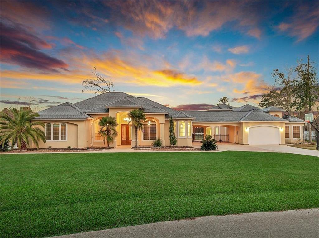 27027 Holly Lord Magnolia, Texas GREAT MULTI-GEN PROPERTY-Tucked among resplendent trees, wide open spaces & starry nights are employed by this gorgeous Mediterranean-style estate where sophisticated splendor is met w/resort-style living. Resting on 2.76 (+/-) ac, beauty sweeps the sprawling residence w/private pond, barn w/stalls & tack room. Unique home has 2 houses separated by glistening waterfall pool. Main house is approx. 3226 sq ft & boasts 2 grand suites+2 bedrooms & 2 baths replete w/quality craftsmanship. Enormity of light & view of grounds overtakes the living areas. The granite kitchen features stainless appliances. Guest house introduces appx 2965 sq.ft. complete w/kitchen offering huge seat-in island, 3 beds, 3 baths & gameroom & bonus studio upstairs
A giant entertainment room measures appx 1315 sq. ft. overlooking the picturesque pond. Large parking court + 2 car garage. Surrounded by postcard worthy grounds, this property embraces a keen awareness of subtle details that set it apart as exceptional!