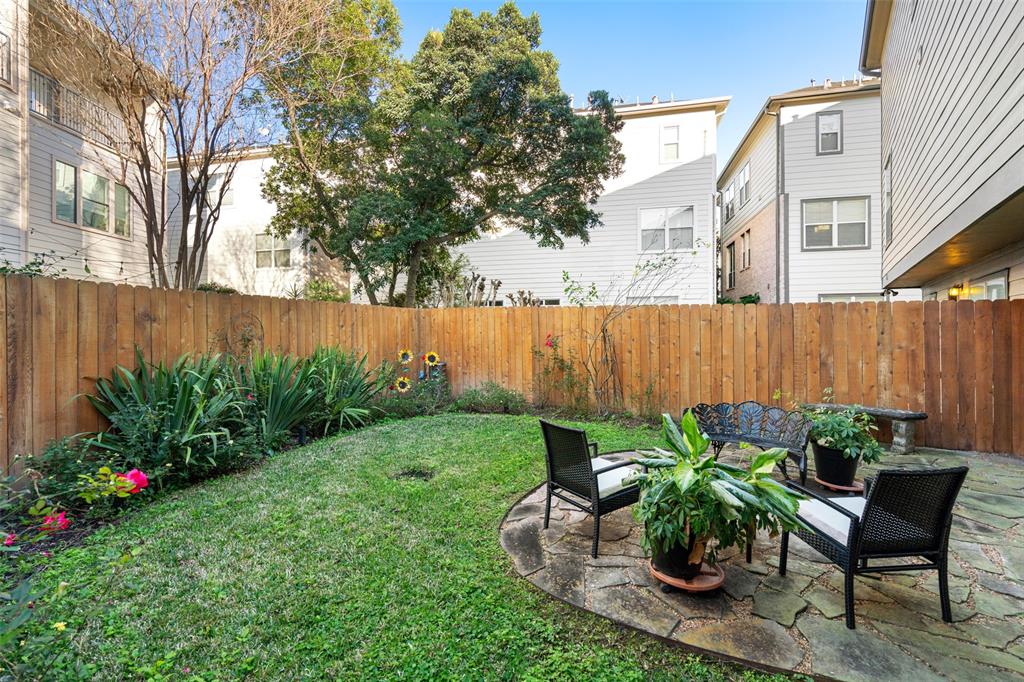 The large, fully fenced back yard is a rare find in the Inner Loop.