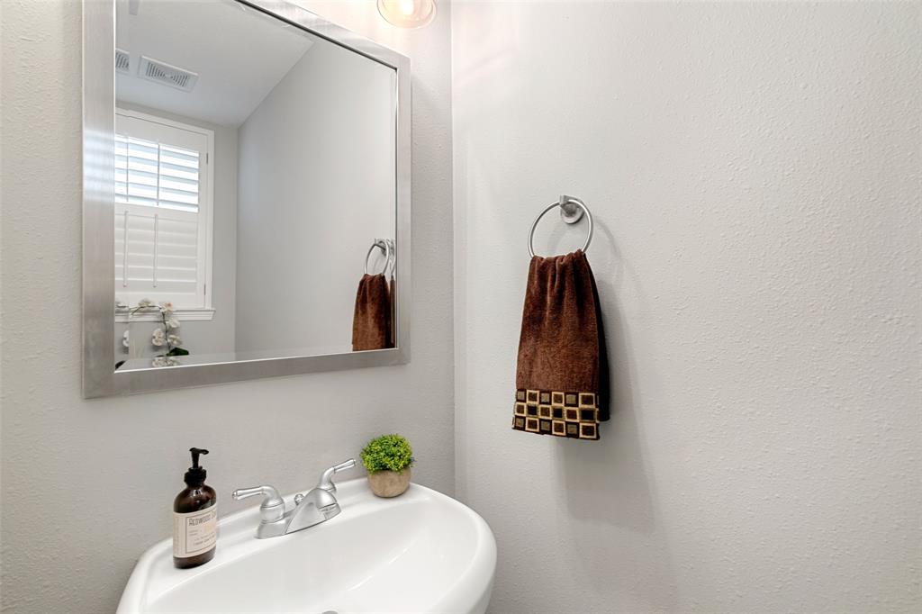 The half bath on the second floor is perfect for guests.