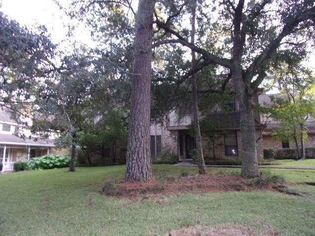 6207 Jadecrest Drive Spring, Texas Stunning traditional home in highly established Northampton subdivision. This home boasts grandeur in every room, from endless built-ins to diamond grid windows and more, this home has tons of personality! Upon entering you will find large formals on either side and an impressive wood paneled living room with floor to ceiling windows. The kitchen holds new appliances and plenty of storage. With 5 bedrooms and a second living room upstairs this home has plenty of room. This unique property has the garage located located in the back of the home secured by a large wrought iron automatic gate for easy access and tons of parking! the large backyard comes with it's own shed for extra storage and covered back patio. Recently cleaned and ready for immediate move in, this home even has lawn maintenance included! Perfectly situated a mere mile from the Grand Parkway and within walking distance to both the elementary and high school in highly desired Klein ISD.