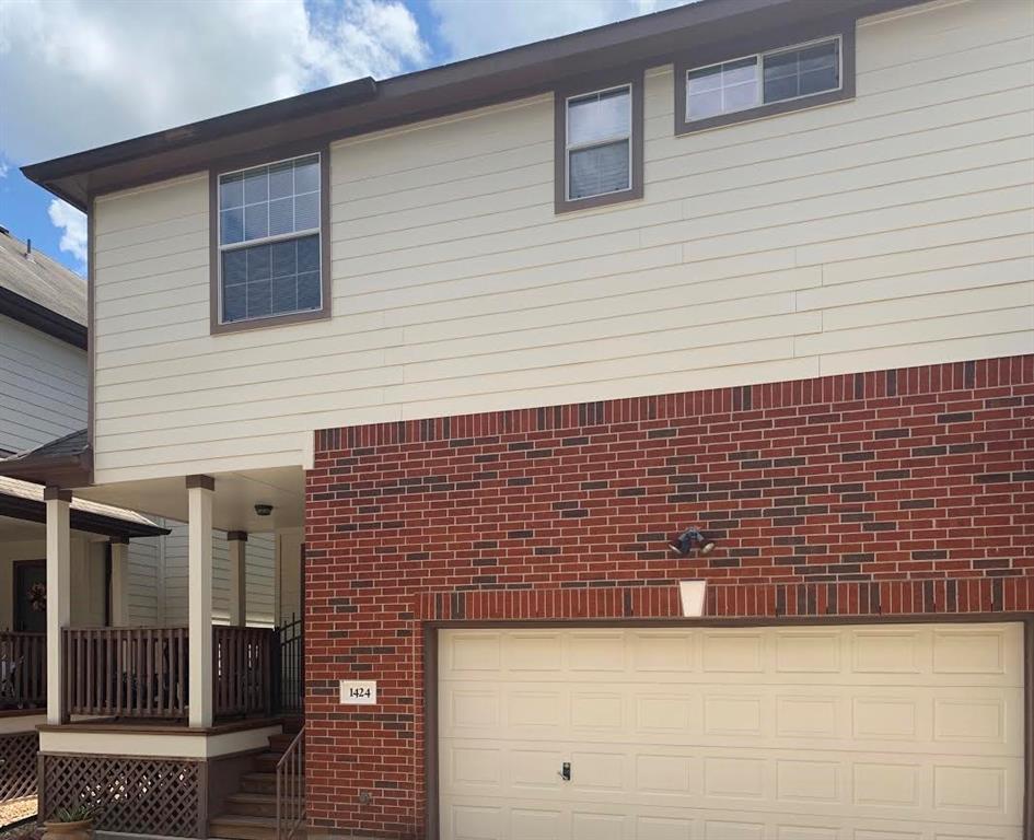Well-maintained townhome with two car garage.