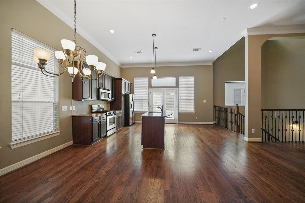 The main living space is entirely open. Making this space great for entertaining. Real hardwood floors stretch throughout this gorgeous space.