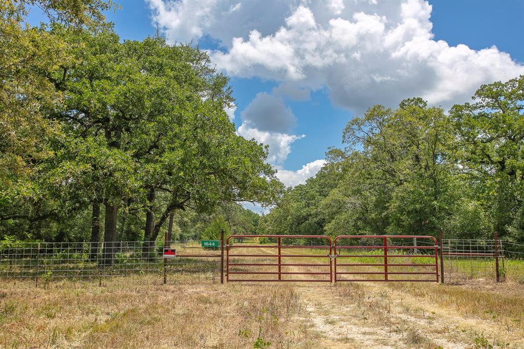 1644 County Road 314 Milano, Texas Hunter's Paradise! This 34.5 acre tract is located in both Burleson and Milam counties. It is mostly wooded, with existing perimeter fencing and loaded with wildlife. Copperas Branch runs across the property and is a potential water source to develop a lake on the property. Electricity is nearby, a water meter is installed (SW Milam Water Co-op) and a septic system will need to be installed for a new custom home or manufactured home or RV hook-up. Very private and secluded. No restrictions, 45 minutes to BCS.