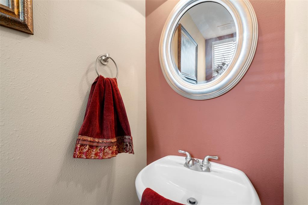 Half bath on the second floor is perfect for guests.