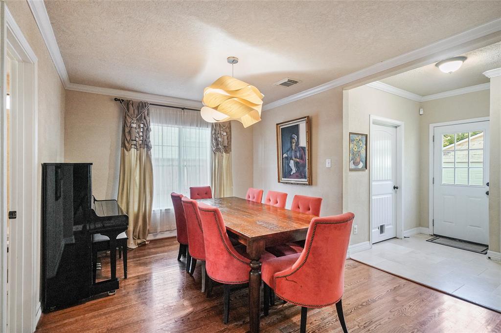 The highly desired and useful dining room area is open to the kitchen, secondary bedroom and kitchen.