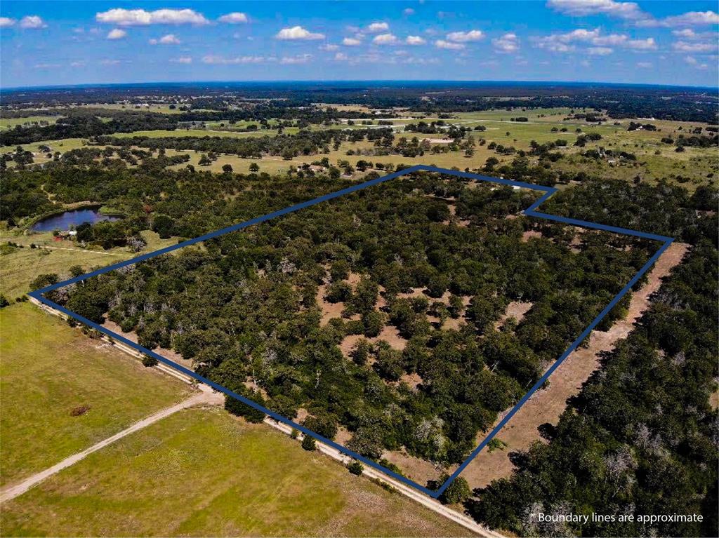 TBD PR 1181 Giddings, Texas Located off a private road, this heavily-wooded, 26.935-acre property is just a short drive outside the Giddings city limits. Perimeter fencing, available electricity, a large pond, and an Ag exemption provide solid starting points for making this place your own.