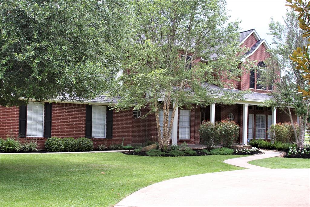 221 Virgie Community Road Magnolia, Texas Exquisite Estate located on 14.0422 unrestricted acres with AG EXEMPTION in Montgomery County. This property is well taken care of and will fit any need. Property includes large pole style barn, white vinyl fencing, water well on site, 2 fishing ponds and plenty of room to roam! Custom home features 4 bedrooms, 3 full baths, dining room, office/study, a large beautiful kitchen with huge center island, SS gas 6 burner range, solid wood flooring, tumbled travertine in kitchen and mater bath, large windows open to the back yard with a breathtaking view of the gorgeous pool and lush landscaping. Very large master retreat features spacious master bath with soaker tub, oversized master closet with an island featuring drawers for extra storage. Upstairs retreat includes 3 bedrooms, 1 full bath, and a large media/game room and so much more! This property is perfect for entertaining, and enjoying country living at its finest! Fabulous location, easy access to SH 249, 99, Beltway 8.