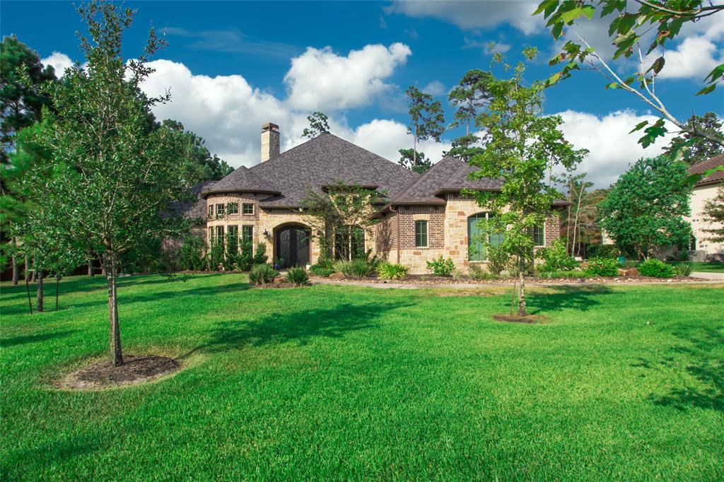 6003 White Birch Run Spring, Texas This one story custom built home is located in the estates section of Benders Landing on a 1+ acre wooded lot w/an abundance of privacy & outdoor adventures right at your door steps. Features stunning 8 ft double cast iron doors, triple trayed 12' ceilings, gorgeous hard wood floors through out, study w/14' wood beamed ceilings, and intricate molding & trim work. The fabulous chef grade kitchen includes lighted glass cabinets, pot filler, huge Quartzite island, under cabinet lighting, chefs double oven gas stove, walk-in pantry, copper farm sink & butler dry bar w/wine storage & fridge. Floor plan boasts 3 wings that include a mudroom, game room, deluxe laundry, an incredible primary suite w/2 closets & all toilets are lighted and heated! Exceptional outdoor living w/outdoor kitchen and a 30'+ covered patio. Has spray foam insulation, dual water heaters & high efficiency systems. 3 car garage has its own mini-split HVAC unit, work space & epoxy flooring. Low tax rate & never flooded.