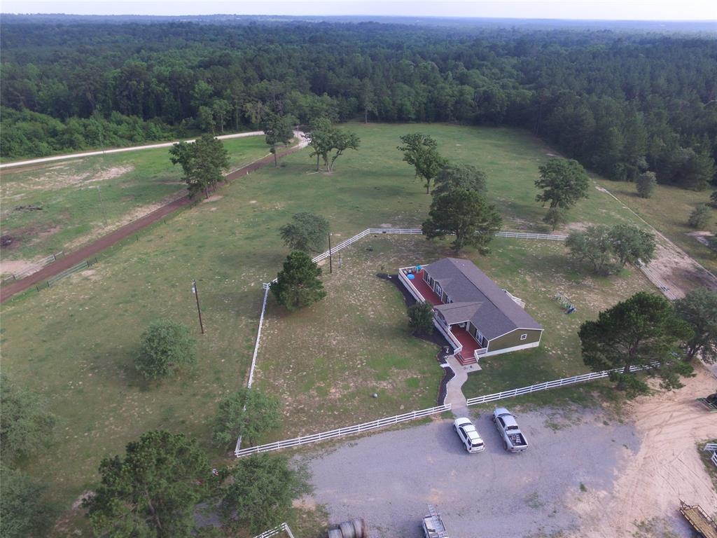 3089 County Road 227 Centerville, Texas BEAUTIFUL very secluded 4 bedroom 2 1/2 bath home in the country sitting on 13.16 acres. Tucked away, Approximately 4 miles off highway 7. Open pastures with room for some cows and horses, also has wooded areas. A pole barn with a metal roof and concrete slab, with water connections, no electricity in pole barn.