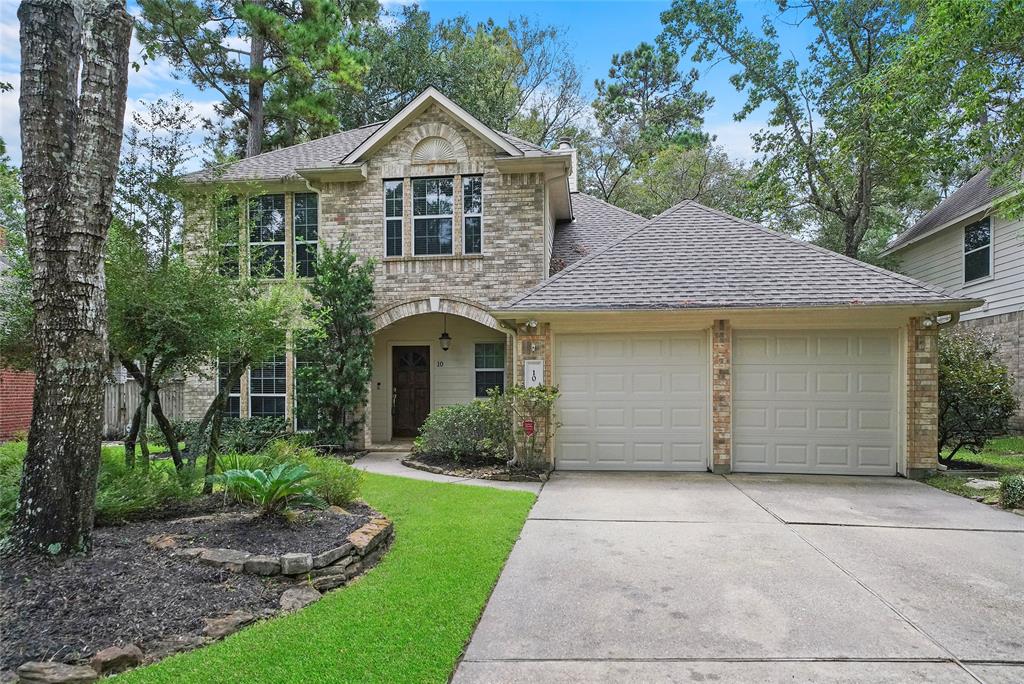 10 Wind Harp Place The Woodlands, Texas Located in a quiet cul-de-sac is this pretty two story home convenient to good schools and park. Home features hand scraped wood floors in most areas down stairs and gorgeous limestone fireplace! Master down with large walk in closet and en-suite bath with separate tub and shower. Kitchen updates include granite counters, stainless appliance and lease includes washer, dryer and fridge. Backyard has large flagstone patio with lush grass and mature landscaping. Upstairs are three other bedrooms, so true four bedroom home! Easy access to all roads for commutes - 1488, 242 & I-45! Lawn service included.