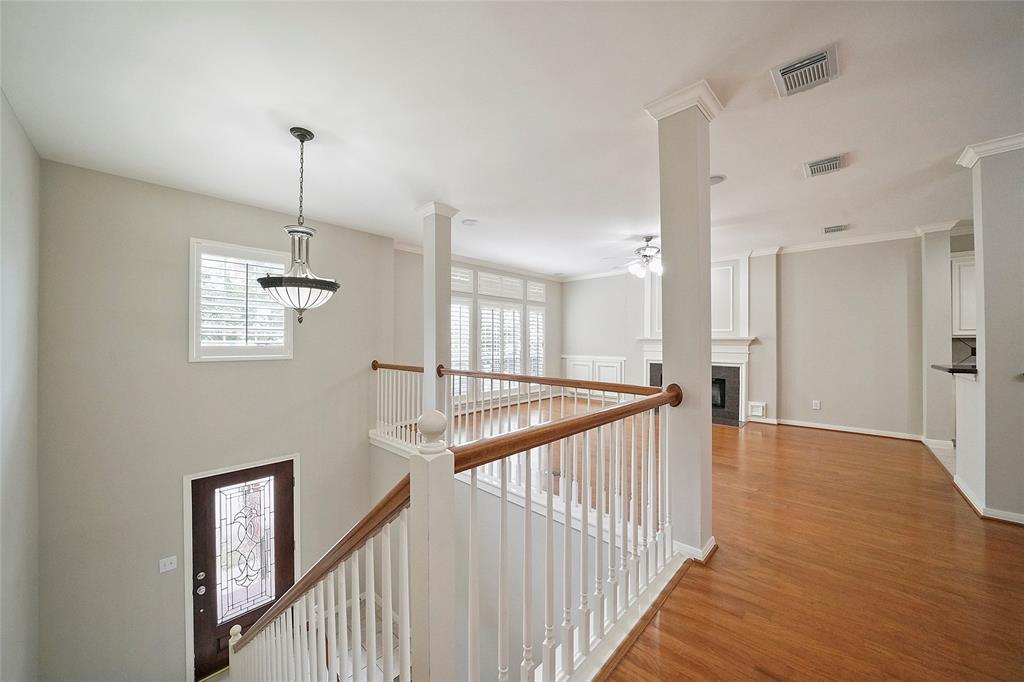 Living space from top of stairs. Open plan living. Bright with high ceilings.