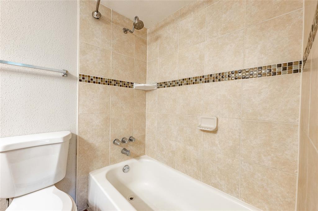 Beautiful tile work in the shower/tub combo.