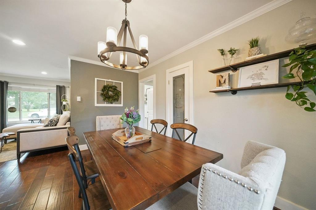 The natural flow of the dining room into the living room provides the open feel you're looking for.