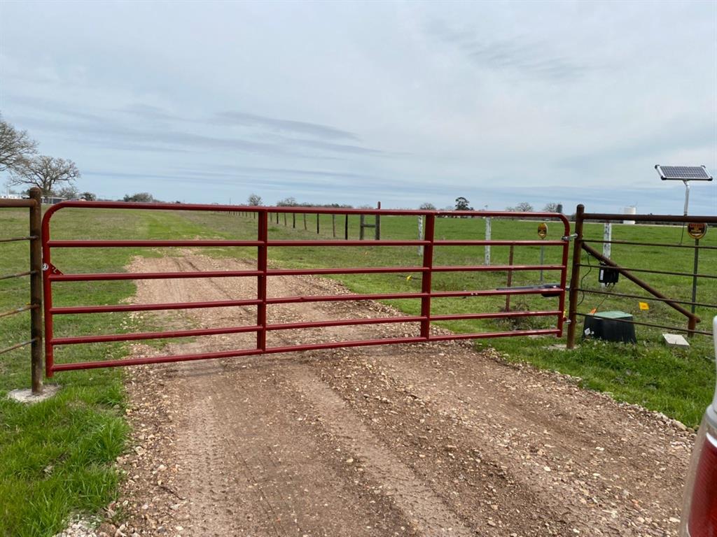 2264 County Road 130 Ledbetter, Texas Tiny home on 22.2 acres, with barn and tack area. Great for horses or cattle. Hay meadow for tax exempt. 2 ponds on property with fish. Fenced and cross fenced. Automatic gate for entrance. Own your own little Ranch.