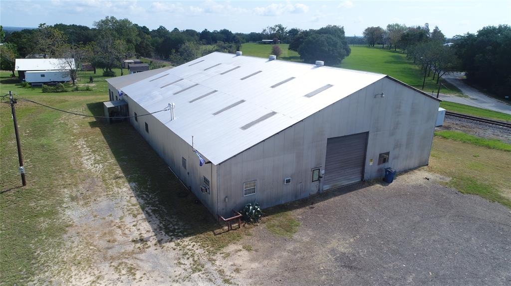 100 Hwy 79 Buffalo, Texas Buffalo Shop on HWY 79 - Great Shop located in Buffalo with all city utilities available. The building has numerous functions for an ideal work shop including -
9800 Total sq. ft,
70x100 concrete floor,
240 - 3 phrase electric service,
7.5 ton bridge crane,
50x100 crane coverage,
3 phase Ingersoll rand air compressor,
Air and electric plumbed thru shop,
.892 acres with rail and Hwy 79 frontage,
Office with restroom,
2 Lockable tool rooms with shelving,
City Water and sewage.
Great Property with many uses.