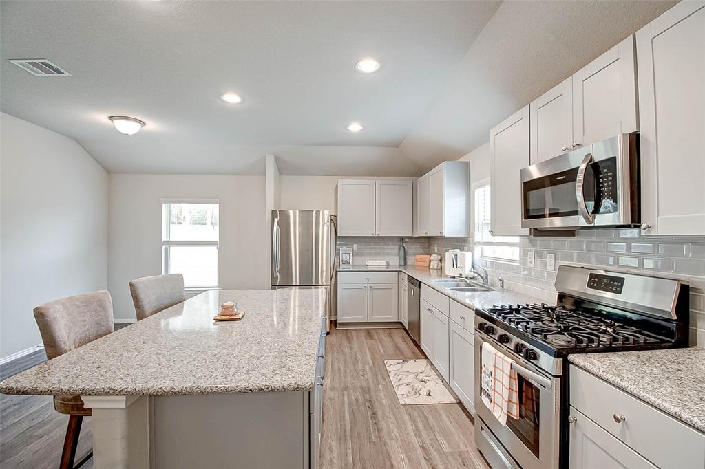221 Stalwart Hill Trail Magnolia, Texas Stunning single story by Rausch Coleman Homes. Lakes At Black Oak is a new Magnolia community situated between I-45 & 249, just minutes away from The Woodlands. Like NEW! Owners purchased home as New Construction in February 2020. Inviting entry with an open concept floor plan. Windows overlooking the expansive private backyard with extended covered patio. Great for entertaining with no back neighbors! The kitchen features stainless steel appliances, walk in pantry and opens up to the family room and dining. Primary bedroom has a generous walk in closet for him and her. Available for immediate move in.