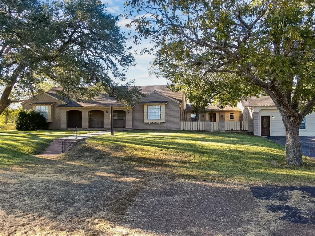 2248 S US HWY 77A Yoakum, Texas Perfect location for business and/or extended family. Houses are very well maintained. Located on 7.6 acres, 3 dwellings. Main house is a 3/4 bedroom, two bath. spacious den, formal dining and living room. Follow by a 1 bedroom apartment house with kitchen, living room. Next a residence with 3 bedrooms and 2 bathrooms, living/dining combo and kitchen. has been completed with tile and wood laminated flooring, granite countertops.
Welcome home!