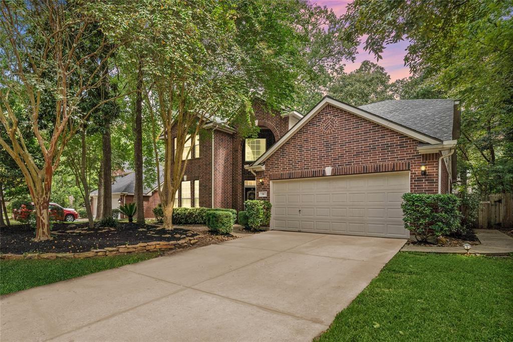 18 Sunny Oaks Place The Woodlands, Texas Enjoy living in The Woodlands with this gorgeous home in Harper's Landing! This home featured beautiful hickory floors throughout most of the downstairs common areas. The charming kitchen has white cabinets, its own breakfast bar, and separate breakfast area. Enjoy cooking family meals with a view into the living room that is complete with high ceilings and a wood burning fireplace. Your primary bedroom downstairs has the same hickory flooring and a spacious bathroom with a separate shower & tub. Upstairs you will find a spacious game room and your secondary bedrooms. Apply today - this home won't last long!