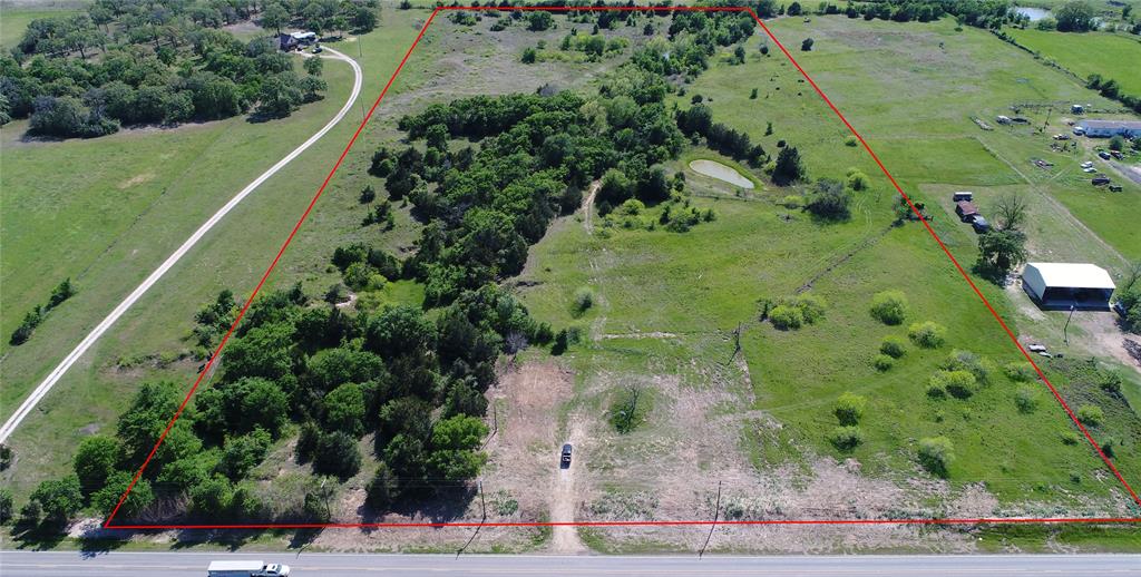 3340 Fm 60 Caldwell, Texas PRICE IMPROVEMENT: This nice 21.498 acres of land offers country living for a home or to graze a few animals. Electricity, water (Deanville Water Corp.) and Septic in place! Great location to build your DREAM HOME in the front or in the back that offers even more privacy. The terrain is mostly level with a pond and trees. Potential end use of this tract of land is excellent for a home, or investment. Minutes from Caldwell and major highways 21 and 36 providing easy access to Bryan, College Station, Brenham and is one hour from Austin. See today!