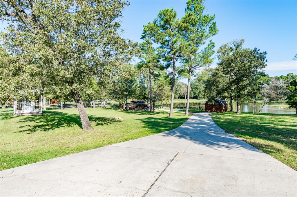 21714 2 Island Lake Loop, Humble, Texas 77338, 3 Bedrooms Bedrooms, 8 Rooms Rooms,3 BathroomsBathrooms,Country Homes/acreage,For Sale,Island Lake,29433606