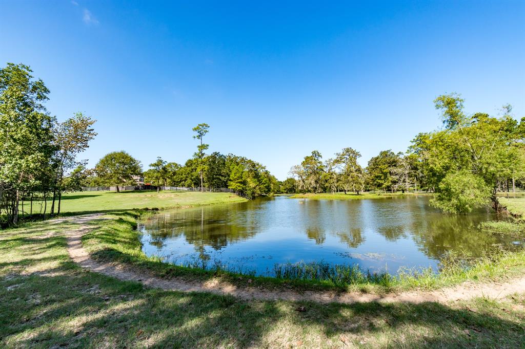 21714 2 Island Lake Loop, Humble, Texas 77338, 3 Bedrooms Bedrooms, 8 Rooms Rooms,3 BathroomsBathrooms,Country Homes/acreage,For Sale,Island Lake,29433606