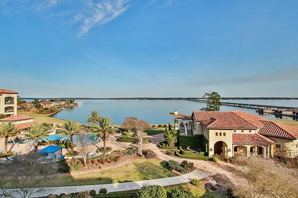 17040 W FM 1097 Road 4205 Montgomery, Texas Remarkable lakefront community offering endless lakeside adventures surrounded by a lush,
tropical landscaping, exquisite style w/ambiance of a Spanish resort. This 4 bedroom 4 bath unit has high ceiling tile flooring in kitchen and living area, granite countertops, and large balcony with great view of Lake Conroe! Amenities include a private clubhouse w/ billiards room, gym, entertainment room & bar infinity edge pool, hot tub, cabana seating & lounge areas, fire-pit, summer kitchen, putting green, courtesy dock & so much more! Schedule your private tour today!