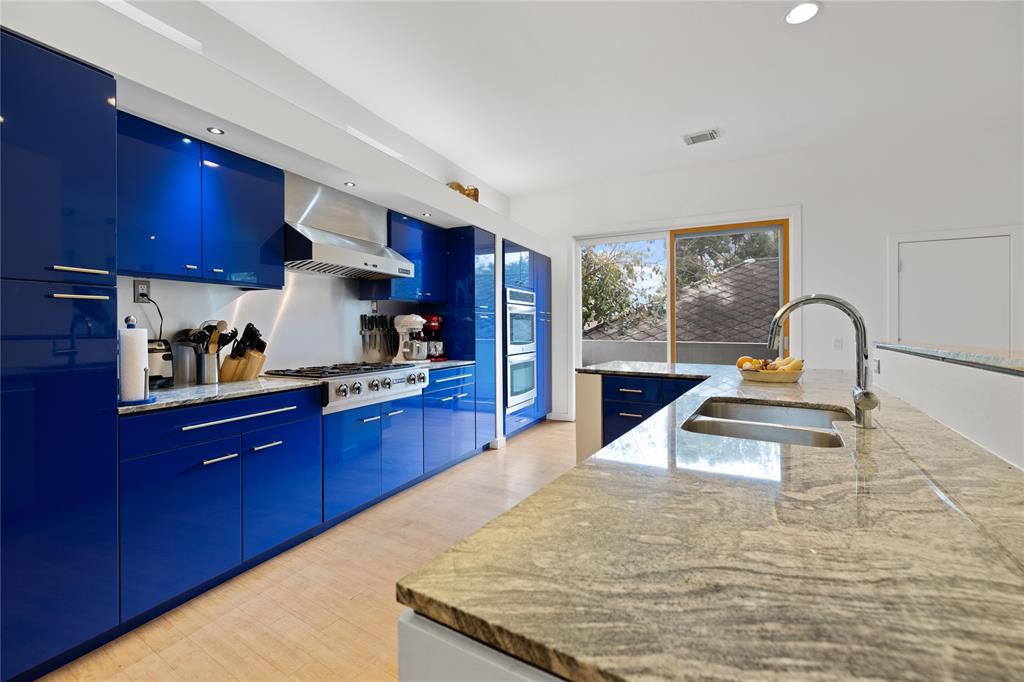 Double ovens, built in range and plush cabinets make this kitchen a dream.