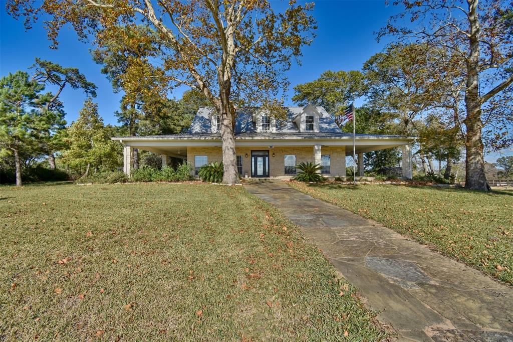 3058 Wiese Road Bellville, Texas Beautiful rolling acreage located in Austin County. The home is the perfect place to call home or make it your country getaway. From its large kitchen, wood floors, large rooms, and the perfect wrap-around porches give you the ultimate in indoor and outdoor entertaining areas. As you make your way to the back of the property you will find the perfect area for wildlife, beautiful terrain, and a spring-fed creek. There is also a detached barn for parking and a workshop, a second barn for your equipment storage, and an outbuilding for storage as well. There is also a charming old farmhouse waiting for you to turn it into the perfect guest house for those large gatherings. It is conveniently located near Bellville, Brenham, and Chappell Hill. With access to both 290 and I-10 for you to commute into Houston. This rare gem is the perfect place for you and your family. Client lost AG evaluation for 2020 but can be reinstated for 2021 per Appraisal District.